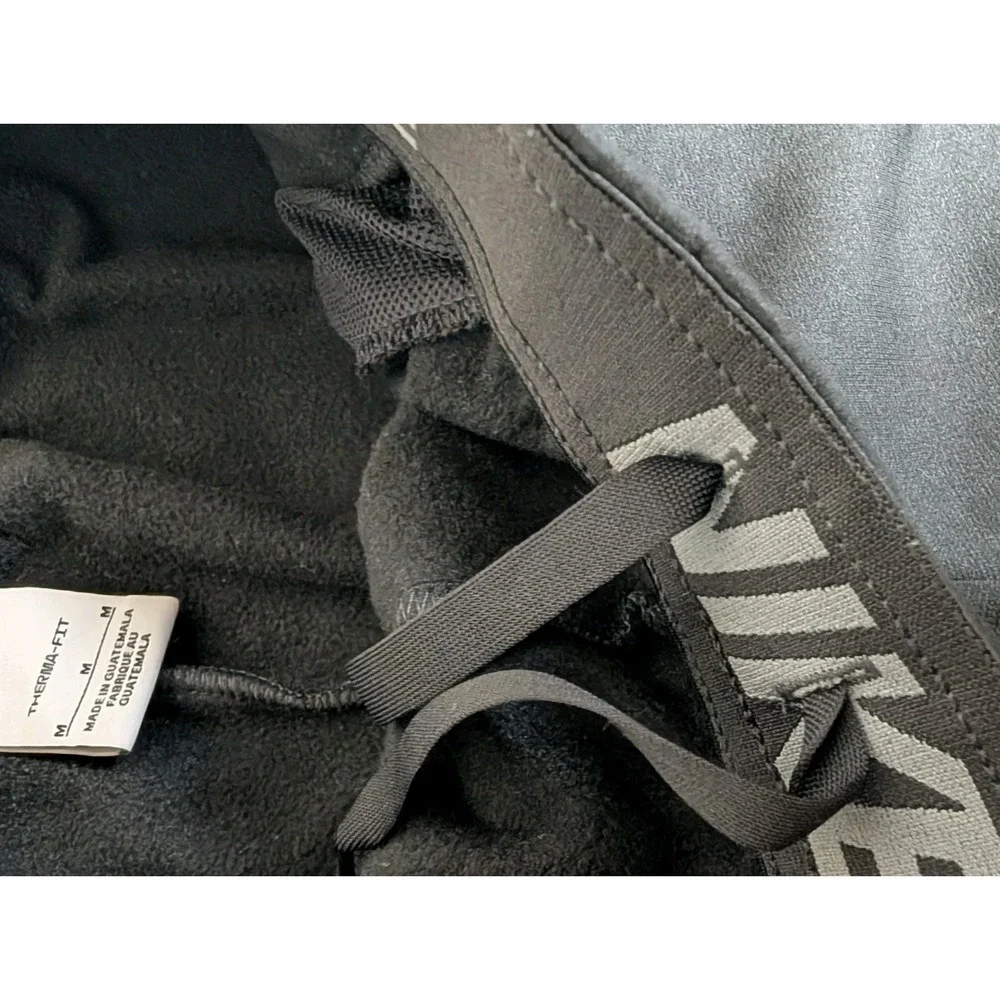 Nike Therma-FIT Jogger Pants Mens Size M Black Fleece Pockets Athletic